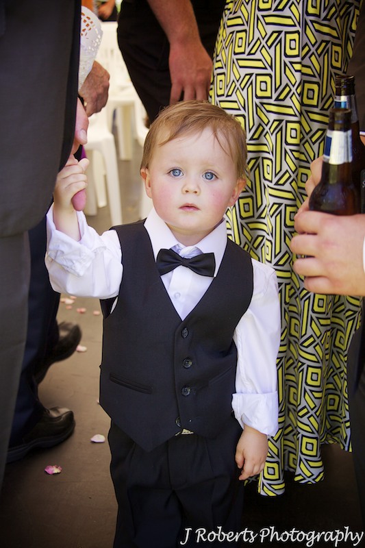 Little boy all dressed up at wedding ceremony - wedding photography sydney